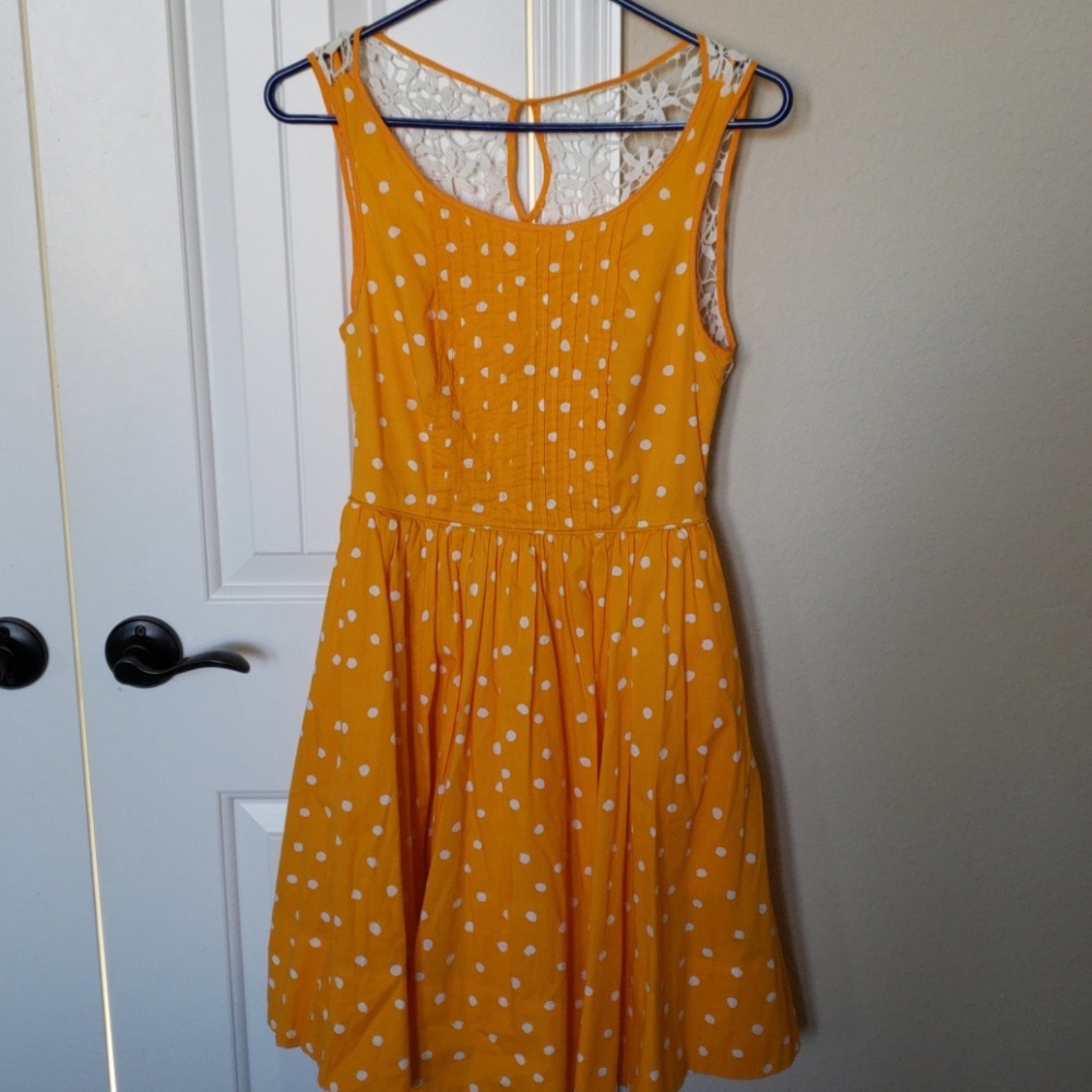 Anthropologie orange and white polka dot dress.